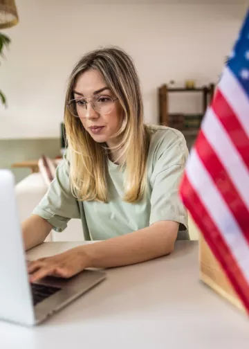  Women looking at her laptop
